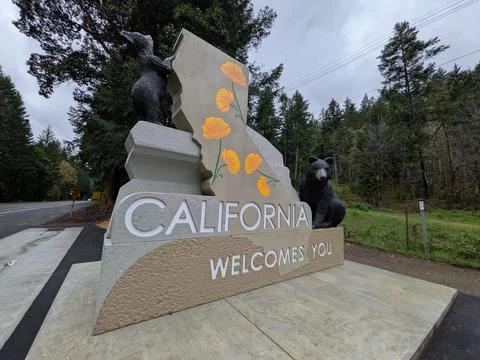 Low angle view of craftsmanship of the California Welcomes You border sign Stock Photos
