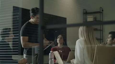 Low angle view of creative business discussing art boards in meeting / Stock Footage 124616361