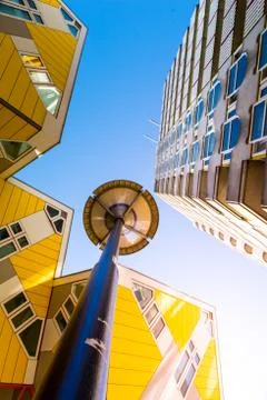 Low angle view of the Cube houses (Kubuswoningen) and Blaaktoren (Het Potlood Stock Photos