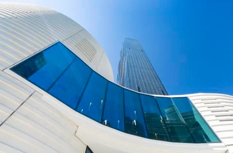 Low angle view of curved modern architecture in Viennas Donau City with the D Stock Photos