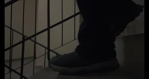 Low-angle view of descending stairs in a multi-story building. M-log 10bit Stock Footage 301487865