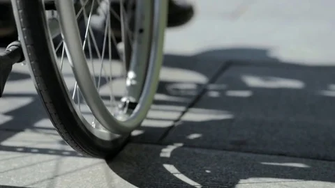 Low angle view of a differently abled man using wheelchair Stock Footage 78104413