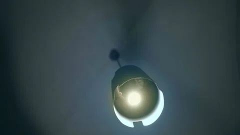 Low angle view of dim lamp with hazy light and a touch of smoke, horror scene Stock Footage 344754926