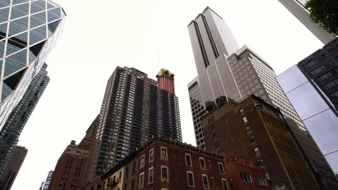 Low angle view drone shot of NYC New York City Manhattan skyscraper buildings Stock Footage 92064395