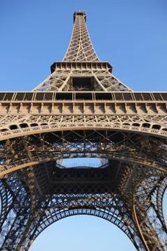 Low Angle View Of Eiffel Tower Against Blue Sky 스톡 사진