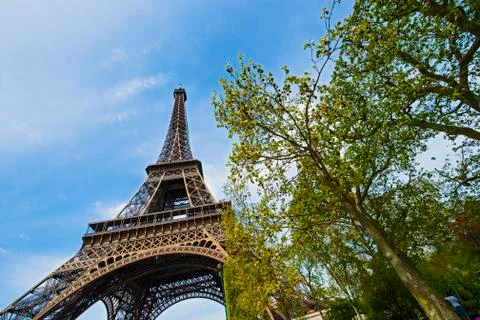 Low angle view of the Eiffel tower in Paris Stock Photos