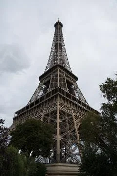 Low-angle view of the Eiffel Tower over the cityscape of Paris, Europe Stock Photos