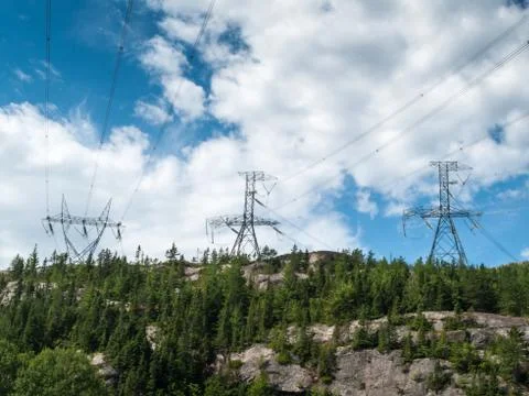 Low angle view of electricity pylons, quebec, canada Stock Photos