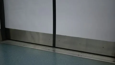 Low angle view to the exit door gate of the subway's door train commuter wh.. Stock Footage 301203764