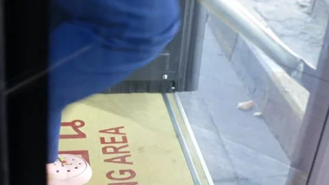 Low angle view to the exit door gate of the bus with passenger get off the .. 動画素材 301207964