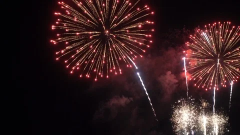 LOW ANGLE view of exploding fireworks in the night sky Video stock 112101311