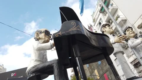 Low Angle View of Famous Osvaldo Pugliese Tango Orchestra Monument Statues in Video stock 337526828
