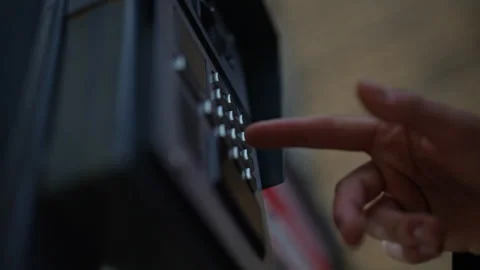 Low-angle view of finger pressing button on intercom keypad, located on building Stock Footage 297623829
