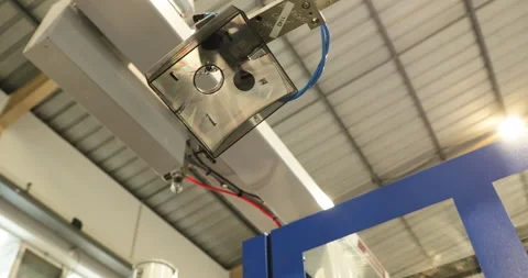 Low Angle View Of Finished Plastic Product Ejected From Injection Mold Stock Footage 169381624