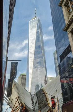 Low Angle View of Freedom Tower and Futuristic Buildings in Financial District Photos