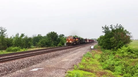 Low-angle view of freight train coming in. Stock Footage 243603774