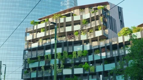 Low-angle view of futuristic glass skyscrapers and modern residential Stockbeeldmateriaal 336376998