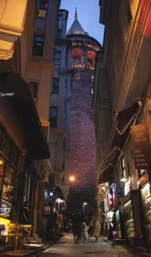 Low angle view on galata tower from a street Stock Photos