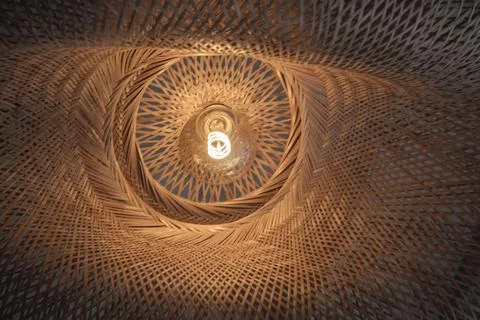Low angle view of geometric lamp in warm glow Stock Photos
