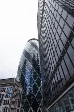 Low angle view of The Gherkin skyscraper in London financial district Stock Photos