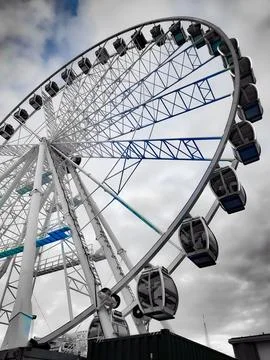 Low Angle View of a Giant Ferris Wheel Photos