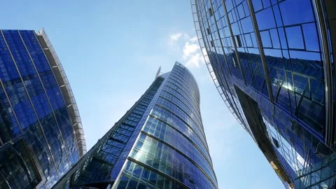 Low angle view of glass skyscrapers in a corporate business district Stock Footage 345138933