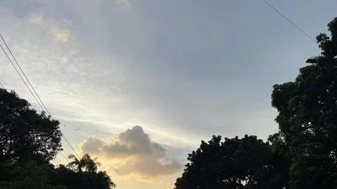 Low Angle View of Golden Hour Clouds and Serene Sky in Evening Stock Photos