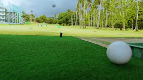 Low Angle View Of Golf Driver Swing As Ball Drops Immediately Near Tee After Inc Stock Footage 330887618