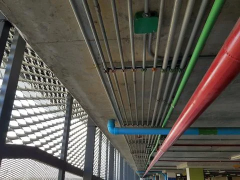 Low Angle View of Group of Pipes on Ceiling Foto stock