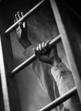 Low angle view of hands climbing ladder Stock Photos