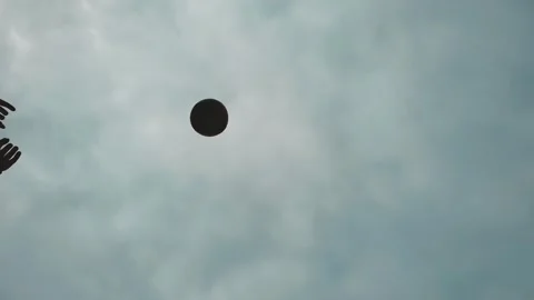Low angle view of hands playing with ball in air Stock-Footage 278914726