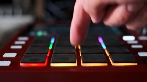 Low Angle View of Hands Playing a Beat on a Drum Pad Machine Stock Footage 311876816