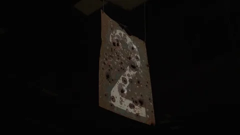 Low Angle View Of Hanging Metal Plate With Bullet Holes Through It Stock Footage 123267366