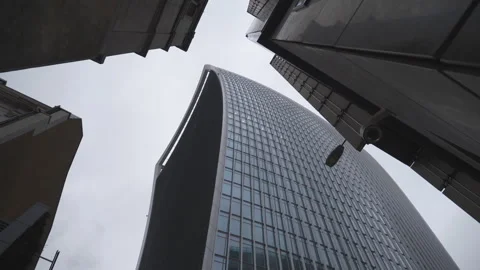 A low angle view of high raise glass offices. Stock Footage 304843221