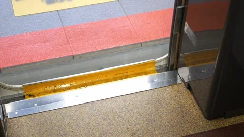 Low angle view to high speed bullet train's door from inside train commuter.. Видео 331304606
