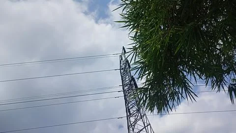 Low angle view of a high voltage power transmission tower Stock Photos