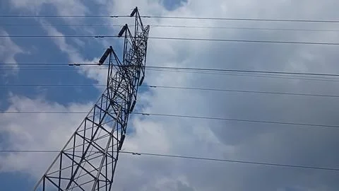 Low angle view of a high voltage power transmission tower Stock Photos