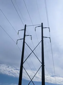 Low Angle View of High Voltage Power Transmission Tower Stock Photos