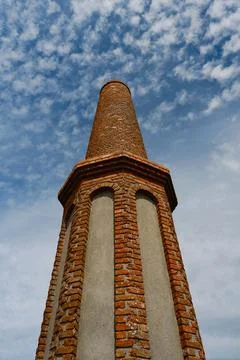 Low Angle View of Historic Brick Mine Chimney Against Sky Stock Photos