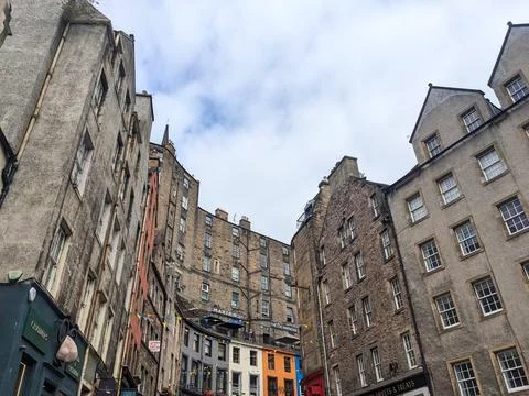 Low angle view of historic buildings on Victoria Street in Edinburghs charming Stock Photos