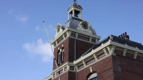Low angle view of historic harbormaster tower with clock Stock Footage 331839439