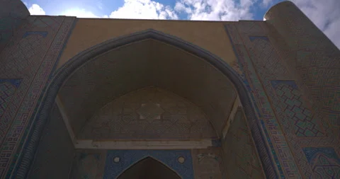 Low angle view of historic Islamic arch and mosaic portal against sky Stock Footage 332432601