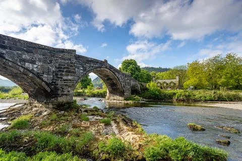 Low Angle View of Historic Pont Fawr Stone Bridge and Tu Hwnt i'r Bont Tear.. Stock Photos
