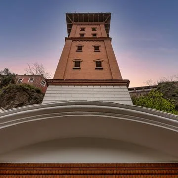 Low angle view of the historical Asansor elevator tower at sunset in Izmir, Stock Photos