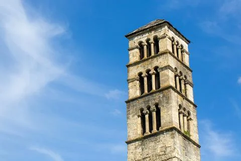 Low angle view of historical St Luke bell tower and medieval church stone w.. 写真素材