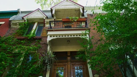 Low angle view of a house with balcony Stock Footage 99924321