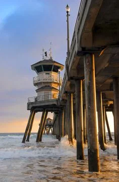 Low angle view of Huntington Beach Pier at sunset Stock Photos