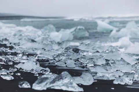Low-angle view on ice shards at Diamond Beach in Iceland. Stock Photos