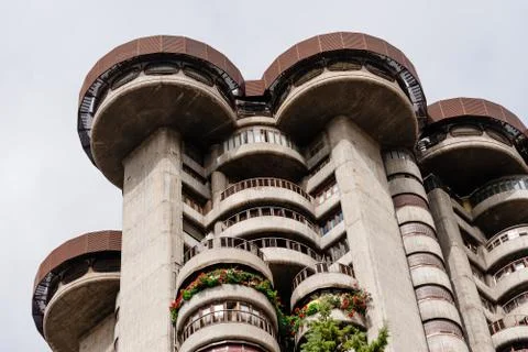 Low angle view of iconic 60s residential skyscraper in Madrid. T Stock Photos
