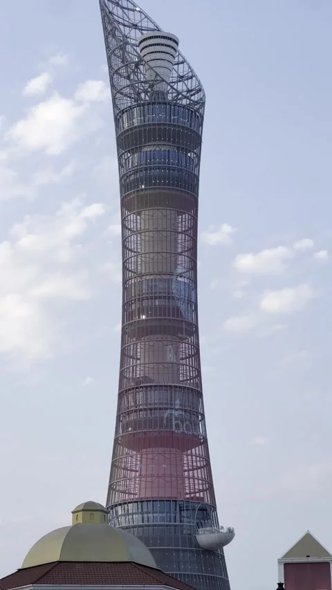A low-angle view of the iconic Aspire Tower, also known as The Torch Doha Stock Footage 337908306